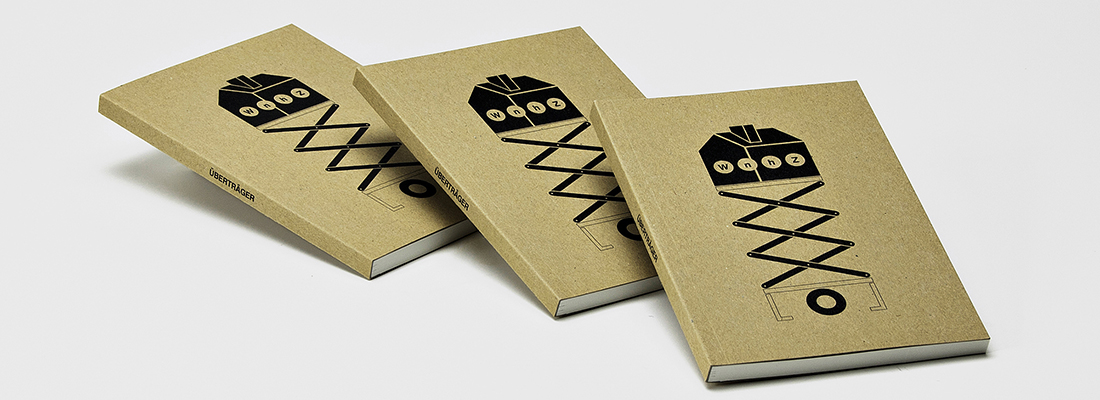 Softcoverbücher mit Umschlag aus Kraftkarton